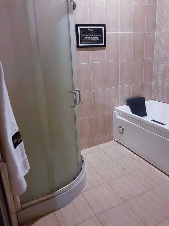 Nicotel Apartments Abuja Chambre photo
